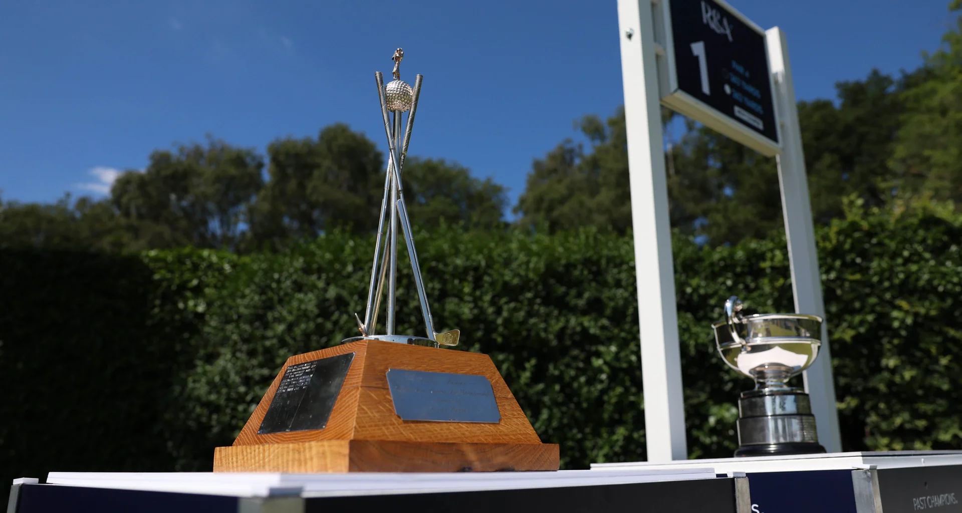 The Men's and Women's Senior Amateur Championship trophies.